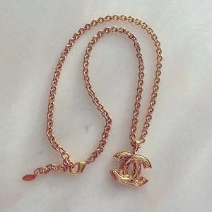 Gold Chanel logo necklace